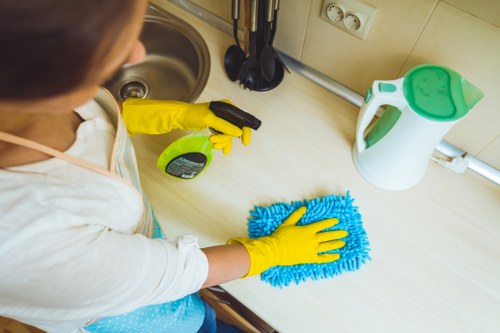 Deep carpet cleaning equipment treating a stained area