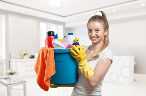 Technician performing steam carpet cleaning on a high-traffic area